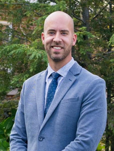 Dr. William den Hollander